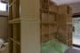 interior-Casa-SymbCity-SD2014-libreria-cabecero-cama