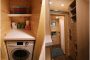 lavadora y almacenaje casita remolque de madera
